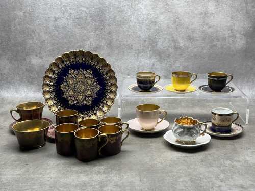 Mainly gilded porcelain demi-tasse duos