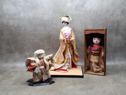 Three Japanese dolls in national costumes