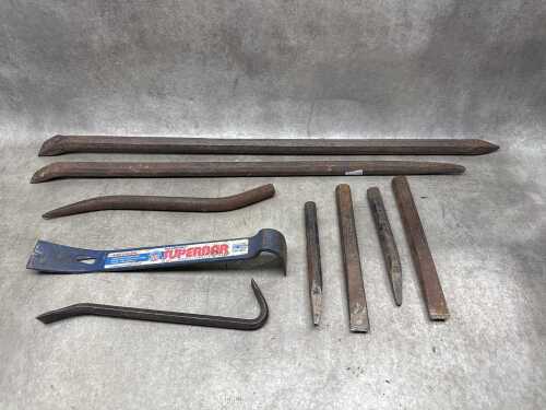 Group of assorted crowbars and picks