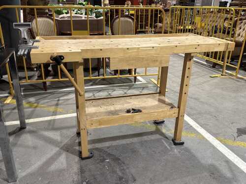 A timber workbench with Zyliss bench vise system