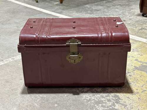 Vintage red metal industrial tool trunk