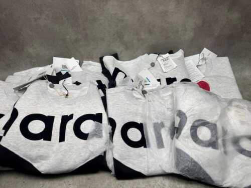 Ten assorted new jumpers, size M-L