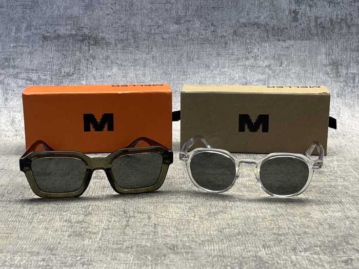 Two pairs of Meller sunglasses