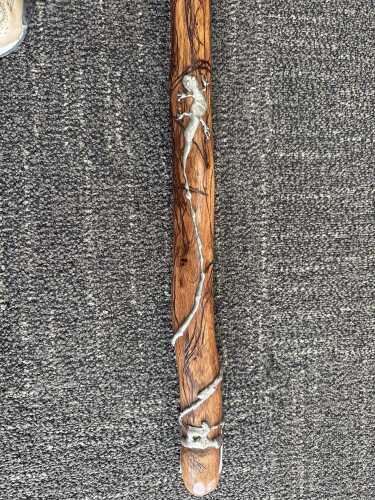 Jerome Lyons, carved timber rainstick with applied pewter lizard, 2004.