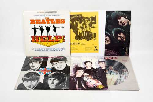 Six Beatles vinyl records