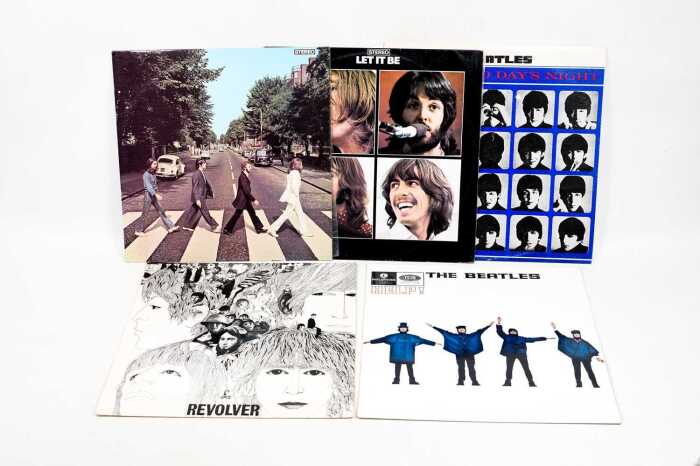 Five Beatles vinyl records