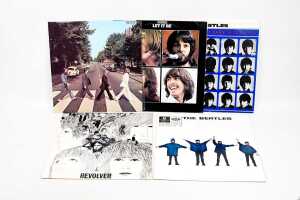 Five Beatles vinyl records