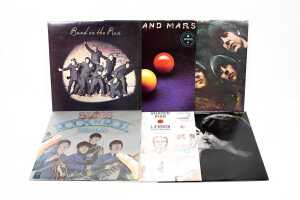 Six Beatles and related vinyl records