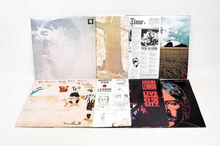 Eight John Lennon vinyl records