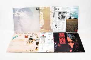 Eight John Lennon vinyl records