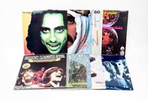 Eight Pop and Rock vinyl records