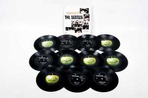 Twelve Beatles and related 7" vinyl records