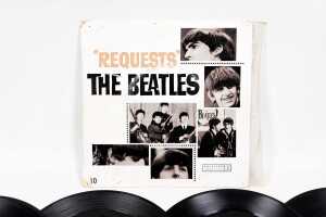 Twelve Beatles and related 7" vinyl records - 2