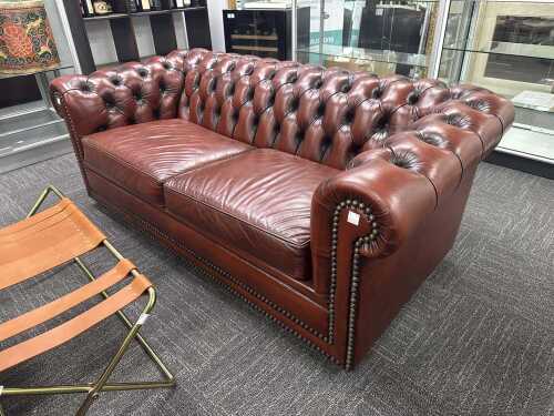 Brown leather Chesterfield two-seater sofa