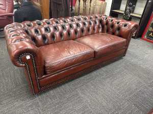 Brown leather Chesterfield two-seater sofa