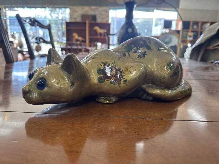 Studio X gold-tone lacquered cat figure with hand-painted floral decoration