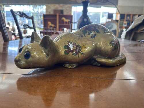 Studio X gold-tone lacquered cat figure with hand-painted floral decoration