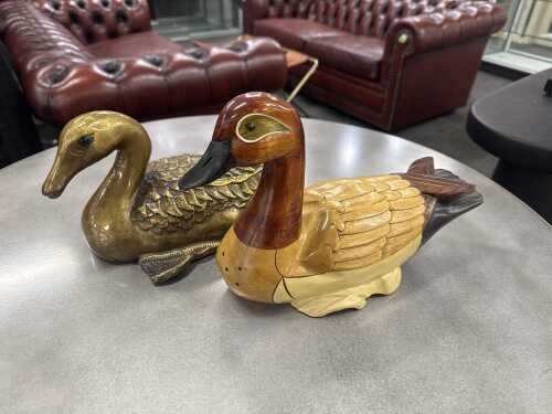 Two decorative duck figures with folk art designs
