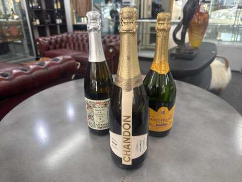 Sparkling wine, three bottles
