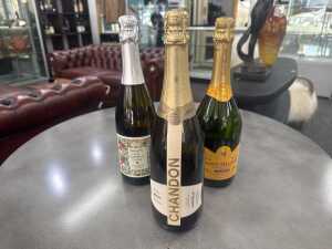 Sparkling wine, three bottles