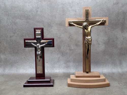 Two standing timber and metal crucifixes