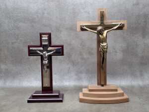 Two standing timber and metal crucifixes