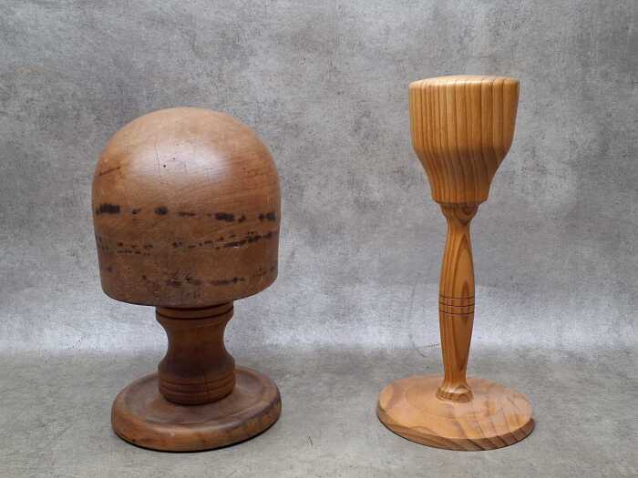 Two turned timber hat blocks