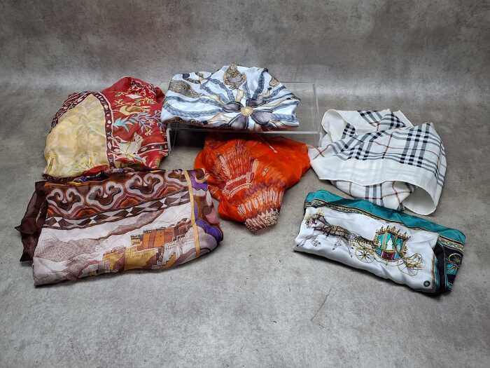 Group of designer-style scarves in assorted colours