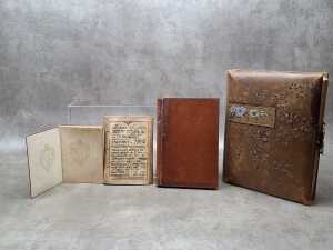 Four antique bound items