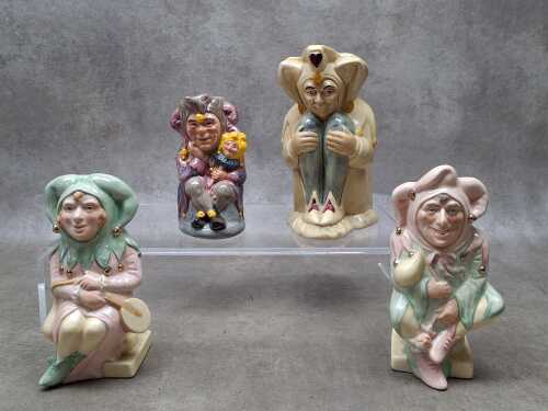Three Royal Doulton and one H.J.Wood ceramic Jester toby jugs.