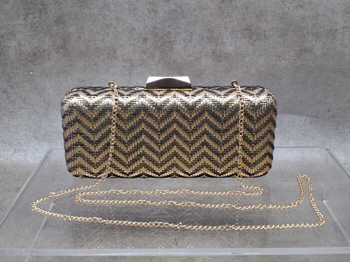 Designer- style clutch purse in gold and black chevron pattern