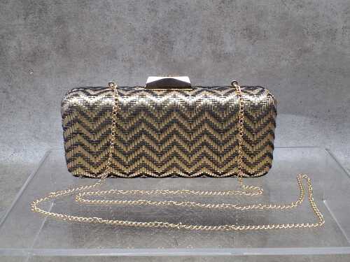 Designer- style clutch purse in gold and black chevron pattern