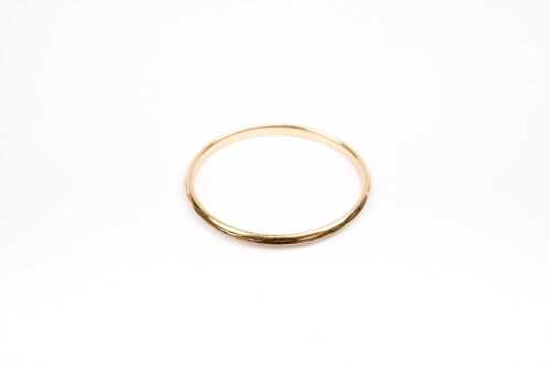 A fine band in 18 carat yellow gold