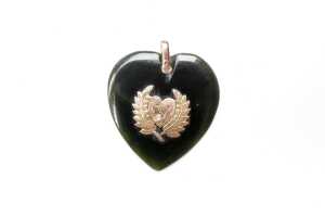 A chrysoprase heart pendant with 9ct bale