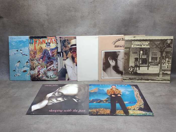 Eight Elton John vinyl records