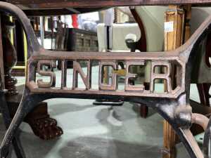 Singer treadle sewing machine in oak cabinet with spinning wheel - 6