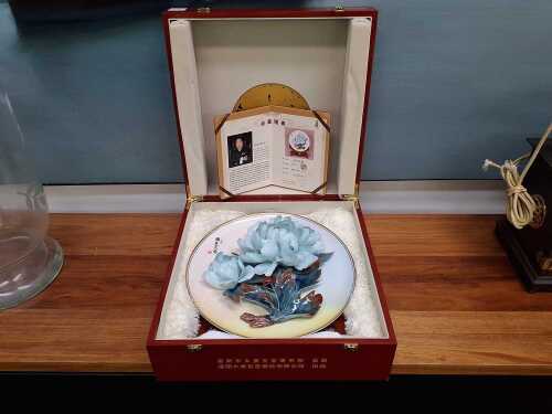 Chinese porcelain cabinet plate with applied floral decoration