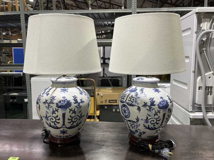 Pair of blue and white table lamps with timber bases