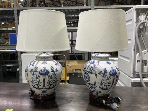 Pair of blue and white table lamps with timber bases
