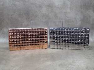 Two designer-style clutch purses