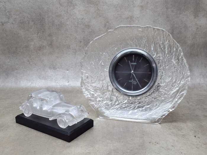 Two clear glass desk items