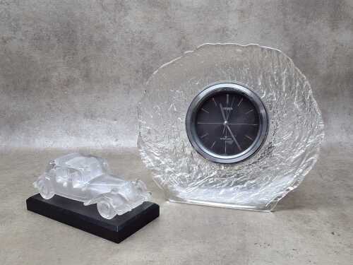 Two clear glass desk items