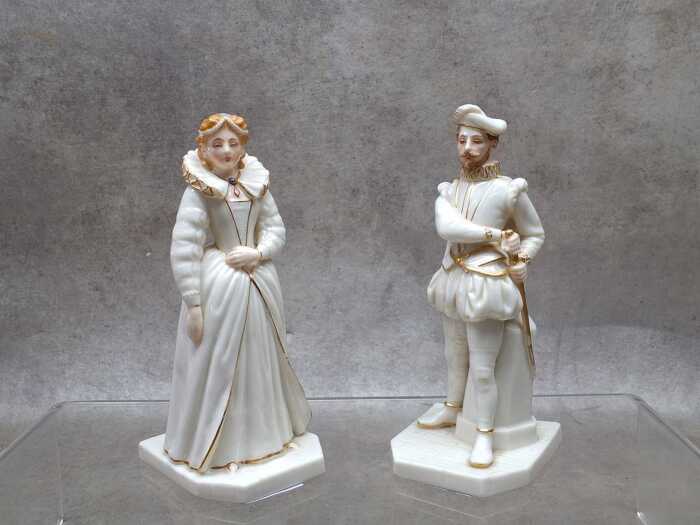 Antique Royal Worcester porcelain 'Queen Elizabeth' and 'Sir Walter Raleigh' figures