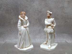 Antique Royal Worcester porcelain 'Queen Elizabeth' and 'Sir Walter Raleigh' figures