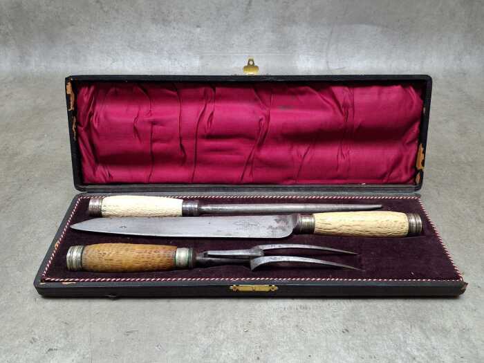 Antique Sheffield carving set with faux bone handles.