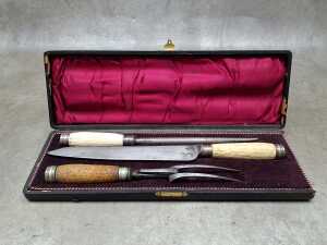 Antique Sheffield carving set with faux bone handles.