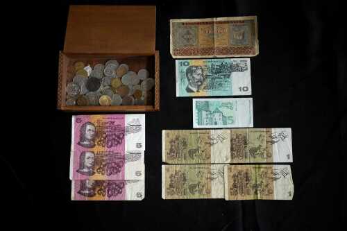 Collection of assorted coins and banknotes