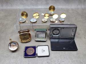 Novelty compasses and travel clocks