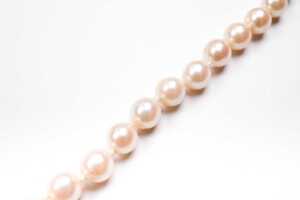 A strand of cultured pearls to a sterling silver clasp - 2
