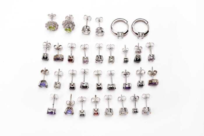 Sixteen pairs of earrings in sterling silver